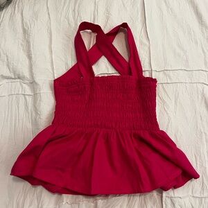 Pink halter top with bow in the back